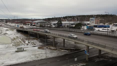 Aerial-view-of-cars-driving-slowly-in-city-center-with-flashing-lights-and-horns-blazing-protesting-against-high-fuel-prizes-at-gas-stations