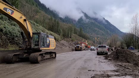 Working-to-repair-and-rebuild-a-forest-service-road-damaged-from-the-flood