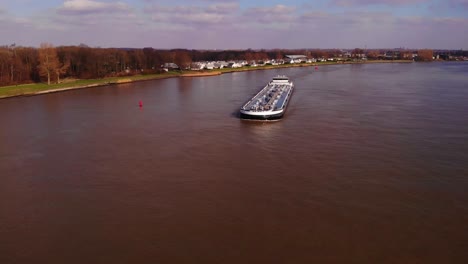 Aerial-View-Of-Noordkaap-Inland-Liquid-Tanker-Approaching-On-Oude-Maas-In-Barendrecht