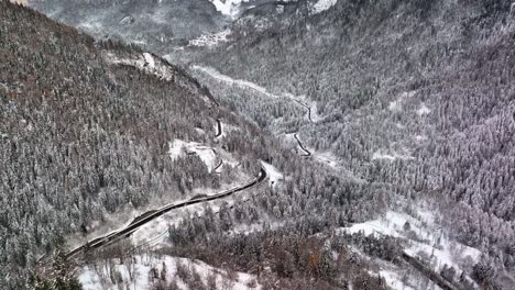 Drone-Aerial-view-of-Dolomites-valley-with-snow-in-winter
