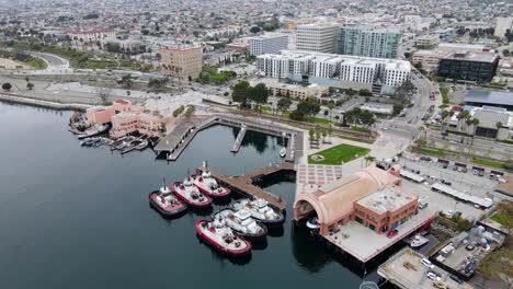 Aerial-view-overlooking-fireboats-and-the-office-of-the-fire-department,-at-the-Port-of-Los-Angeles,-in-California,-USA