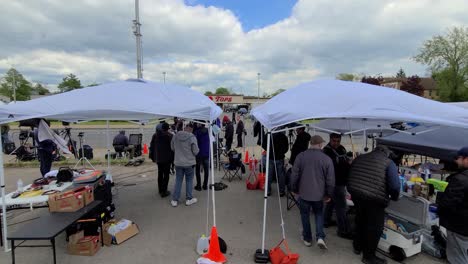 Media-and-news-teams-on-location-after-mass-shooting-in-Buffalo,-NY