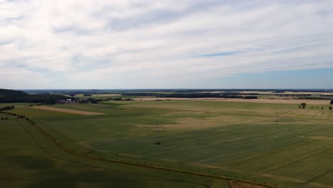 Fields-in-the-distance-large-chimney-that-smokes
Marvelous-aerial-view-flight-panorama-curve-flight-drone-footage-in-Europe-Saxony-Anhalt-at-summer-2022