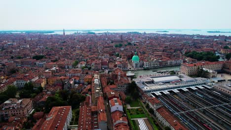 Flying-Over-Famous-City-Of-Venice-By-The-Grand-Canal-In-Italy