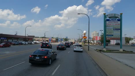 Traveling-in-the-Illinois-Chicago-land-area,-suburbs,-streets,-and-highways-in-POV-mode-slow-down-traffic