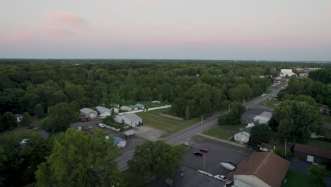 Shot-over-small-town-during-sunset