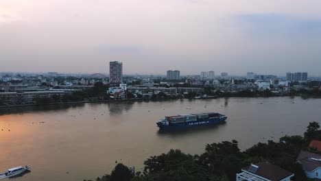 Loaded-container-ship-on-Saigon-river-at-sunset