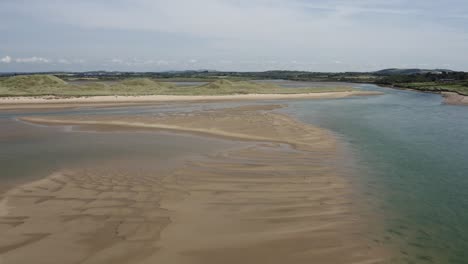 Large-river-sand-bar-revealed-at-low-tide-along-Irish-coast-at-Tramore
