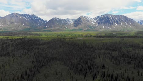 4K-Drone-Video-of-Mountain-Peaks-and-Granite-Creek-near-Denali-National-Park-in-Alaska-on-Sunny-Summer-Day