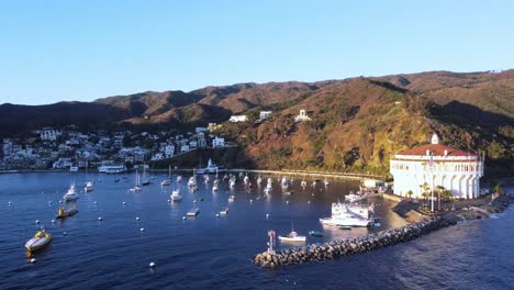 Drone-slow-fly-in-to-Avalon-harbor-with-Catalina-Casino-on-the-right