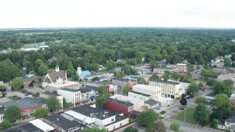 Greenville,-Michigan-skyline-with-drone-video-moving-down-at-an-angle