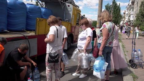 Mykolaiv-residents-queue-up-for-drinking-water-at-an-emergency-supply-truck-after-the-mains-supply-was-contaminated-during-the-Russian-war-of-Ukraine