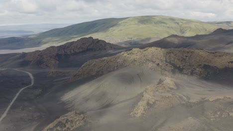 Aerial-orbit-shot-of-Volcanic-landscape-in-the-highlands-of-Iceland---Spectacular-wide-shot-during-cloudy-sky
