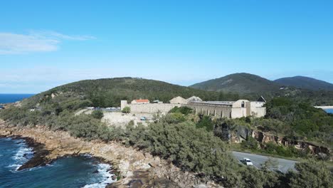 Aerial-view-of-the-heritage-listed-former-public-works-prison-built-on-a-coastal-headland