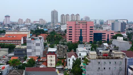 residential-apartment-blocks-in-local-Jakarta-neighborhood,-aerial