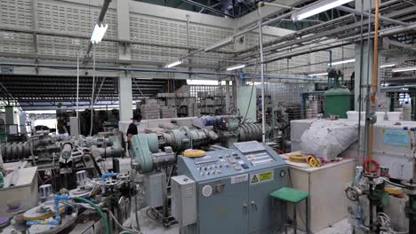 Asian-Workers-Working-in-Ceramic-Factory,-Wide-Shot