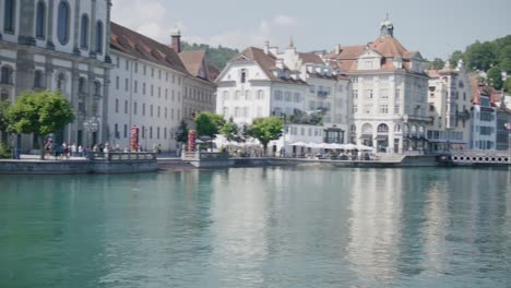 Luzern,-Switzerland,-bridge,-lake,-Church,-tourists,-walking,-downtown,-popular,-medieval,-architecture