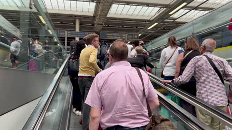 POV-view-of-passengers-arriving-at-platform-of-London-Eurostar-station-St-Pancras-International