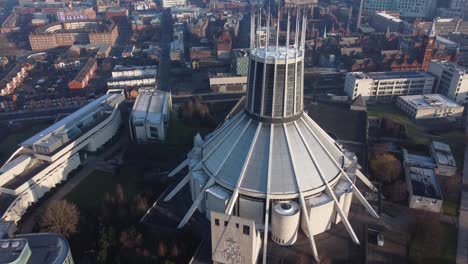 Liverpool-Metropolitan-cathedral-contemporary-city-famous-rooftop-spires-aerial-tilt-down-birdseye
