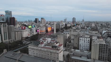 Aerial-parallax-of-9-de-Julio-avenue-transit-and-obelisk-monument-in-Buenos-Aires-downtown