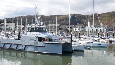 Fisheries-patrol-boat-moored-at-Conwy-marina-Luxury-yachts-boating-waterfront-North-Wales
