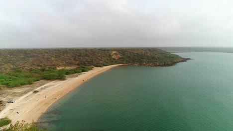 Drone-view-of-a-tropical-beach-with-beautiful-sea-and-waves