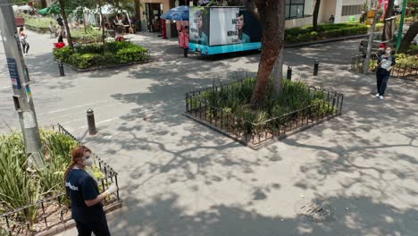 above-shot-of-doctor-actor-standing-at-public-square-at-la-condesa-public-square