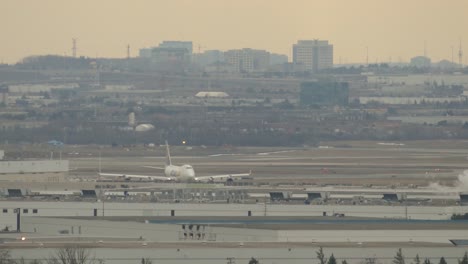 Atlas-Air-aircraft-slowly-taxiing-on-the-runway-ground-in-Toronto-International-Pearson-Airport-YYZ-in-heavy-air-pollution-and-smog-atmosphere