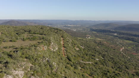 Aerial-view-from-the-greatest-Rocha-da-Pena-located-at-Estrada-de-Salir,-Loulé,-Portugal