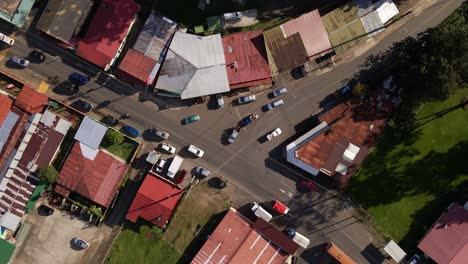 Aerial-view-from-vertically-above-a-busy-intersection-in-Los-Angeles-de-la-Fortuna,-Costa-Rica