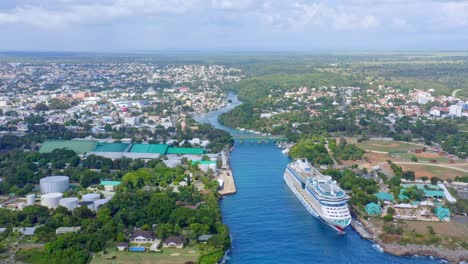 Cruise-ship-moored-in-La-Romana-Marina-and-overview-surrounding-landscape,-Dominican-Republic