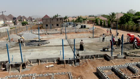Sobrevuelo-Aéreo-De-Un-Gran-Proyecto-De-Construcción-En-El-Suburbio-Lokogoma-De-Abuja,-Nigeria