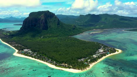 Aerial-view-of-Mauritius-island-panorama-and-famous-Le-Morne-Brabant-mountain,-beautiful-blue-lagoon-and-underwater-waterfall