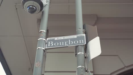 Bourbon-Street-Sign-in-New-Orleans,-Louisiana,-French-Quarter-District