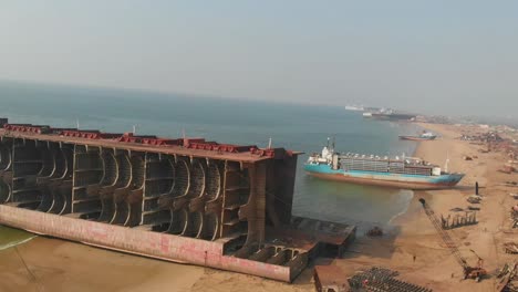 Aerial-View-Of-Partially-Dismantled-Ship-At-Beach-At-Gaddani-In-Pakistan