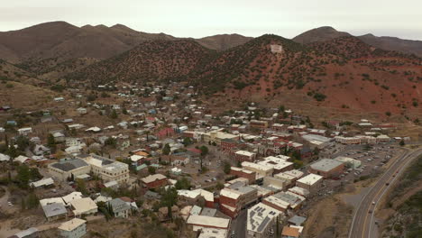 Bisbee-Arizona,-USA-4k-aerial-drone-view-of-homes-and-highway