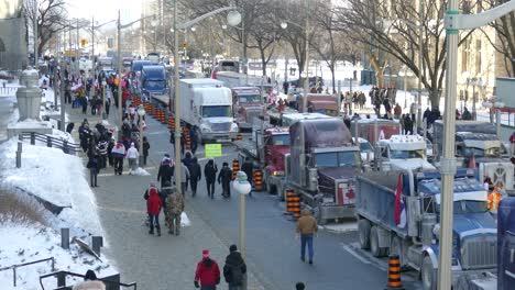 People-protesting-on-Ottawa-streets,-Freedom-Convoy-protest-against-COVID-19-vaccine
