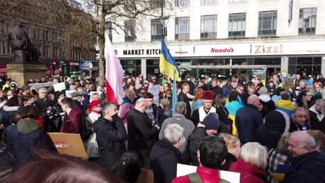 Patriotic-crowd-gathering-of-anti-war-protest-supporters-in-Manchester-city