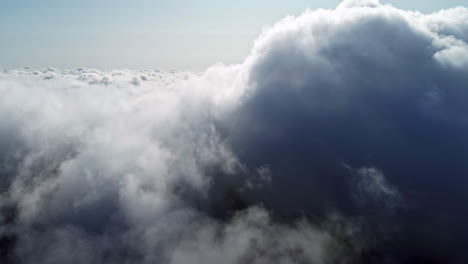 Aerial-drone-shot-flying-through-amazingly-beautiful-white-clouds