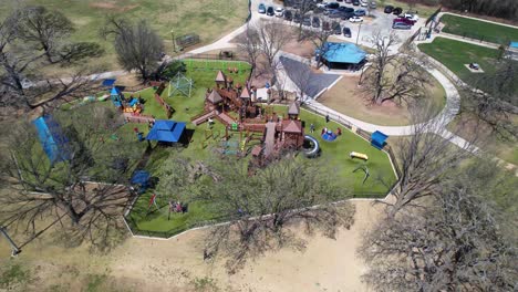 Aerial-footage-of-the-Kid's-Kastle-playground-at-Unity-Park-in-Highland-Village-Texas