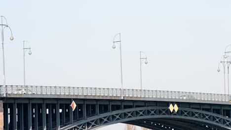 Several-vehicles-driving-over-the-Theodor-Heuss-bridge-on-a-sunny-afternoon-in-Mainz
