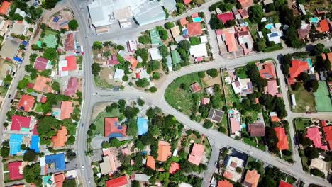 Overhead-view-truck-left-of-the-residential-neighborhood-of-Mahaai-Buurt,-Willemstad,-Curacao,-Dutch-Caribbean-Island