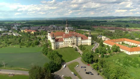 An-aerial-view-of-Military-Hospital-Olomouc-is-surrounded-by-lush-greenery