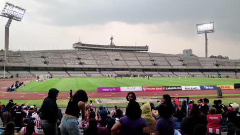 people-celebrating-the-soccer-victory-of-the-women's-league-in-the-university-city-stadium-in-a-video