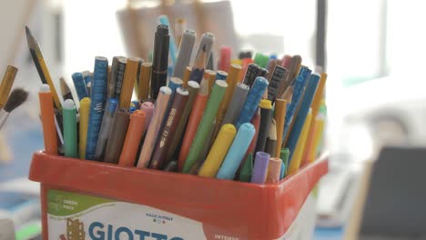 A-box-full-of-assorted-colouring-pencils-and-markers