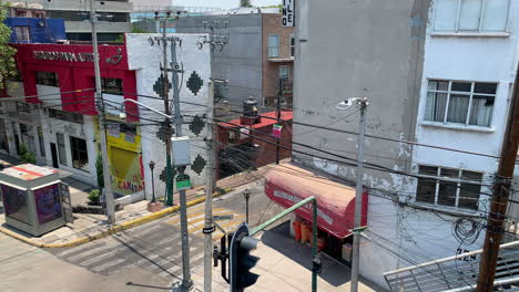 View-Of-Powerlines-Crossing-Empty-Street-In-Mexcio-City