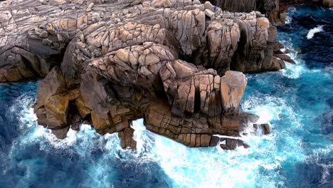Aerial-shot-of-beautiful-rock-formation-called-paper-cliffs,-in-Morás,-Xove,-Lugo,-Galicia,-Spain-at-daytime