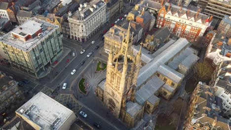 Aerial-arc-shot-of-St-Nicholas-Cathedral,-Newcastle,-UK