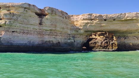 Portugal-algarve-coastal-rock-formations-with-arches-and-wild-waves