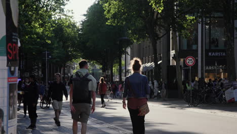 Pedestrians-on-Mönckebergstraße,-Hamburg-on-a-Summer-day
